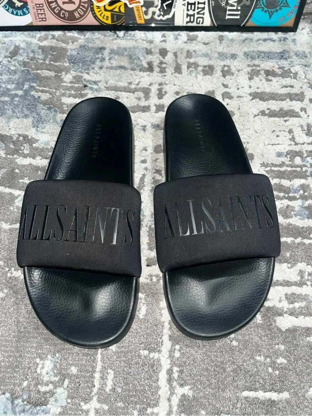 AllSaints Black Logo Slide